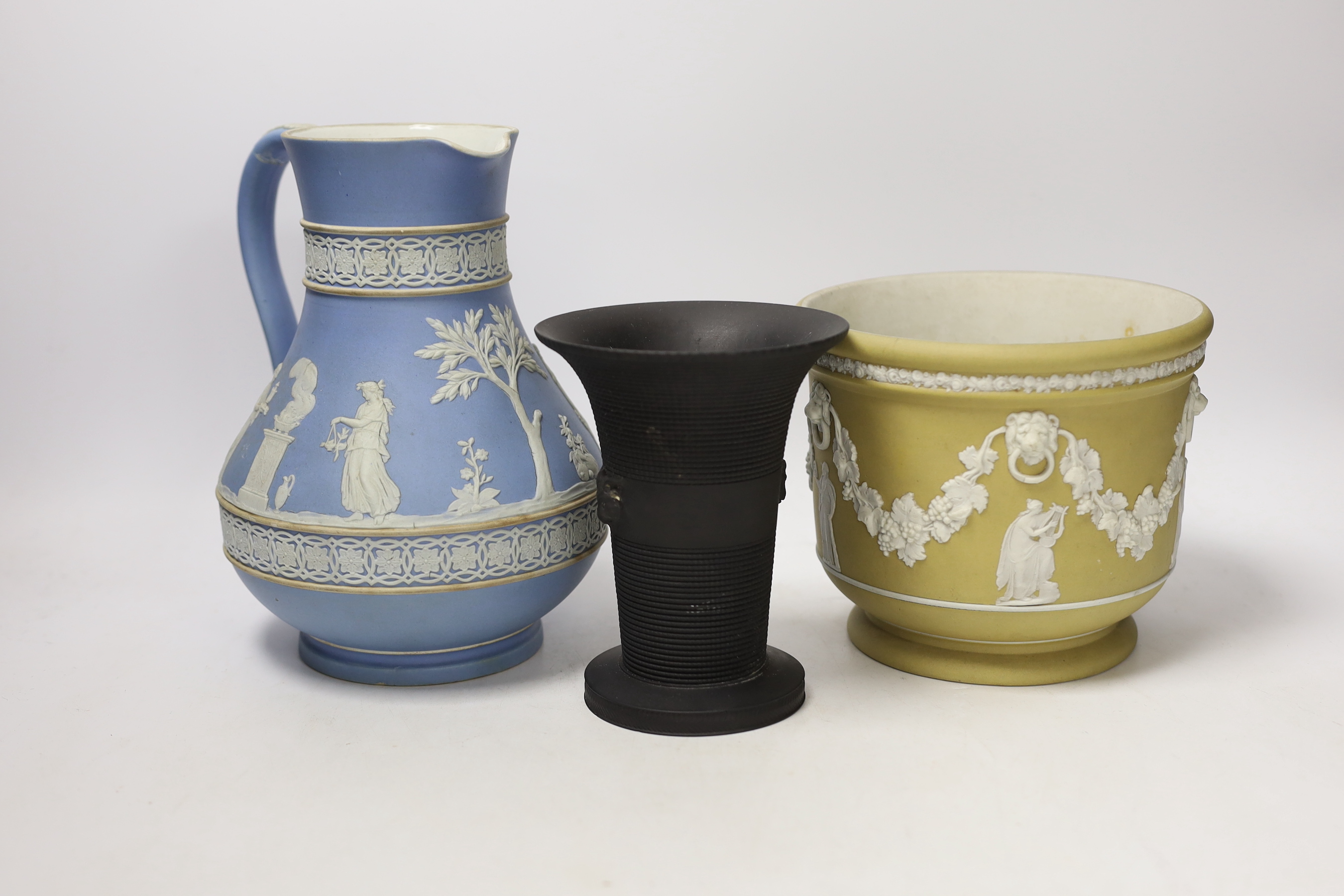 A Wedgwood jasper jardiniere and jug and a black basalt vase, tallest 21cm